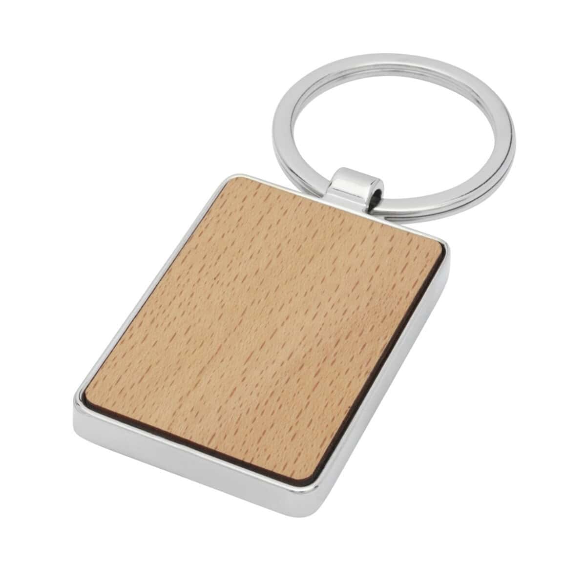 Gadżet na breloczku z drewnianą powierzchnią i metalową ramką.