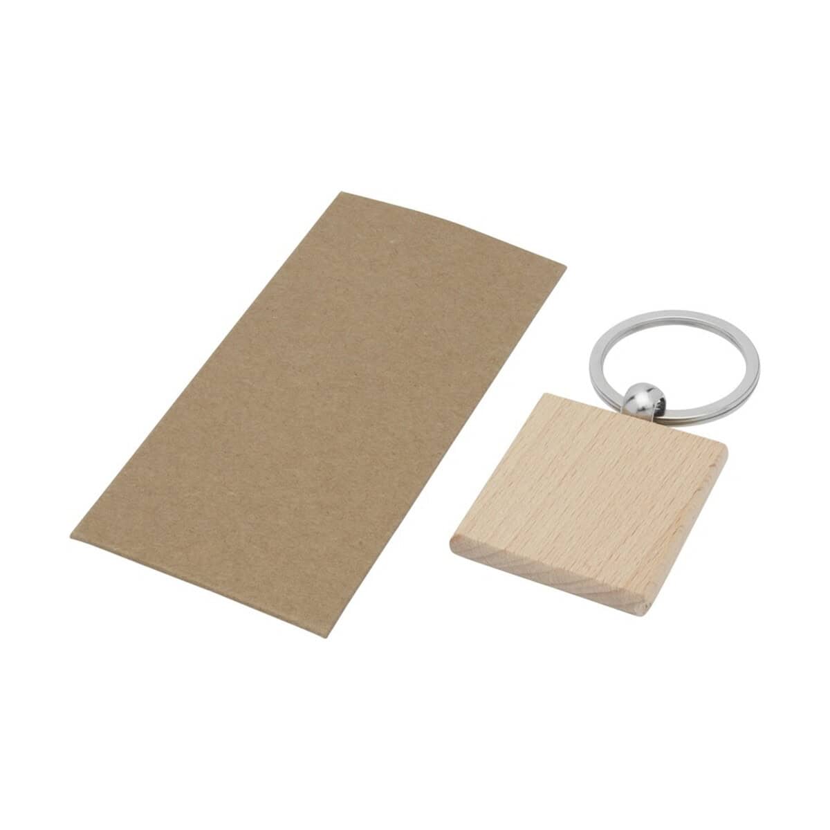 Breloki wielofunkcyjne z logo – kwadratowy brelok do kluczy gioia z drewna bukowego 11812171_e1 Słabo wykonany brelok z drewna i metalu na prezent, gadżet reklamowy z personalizacją, idealny upominek dla klientów i pracowników.