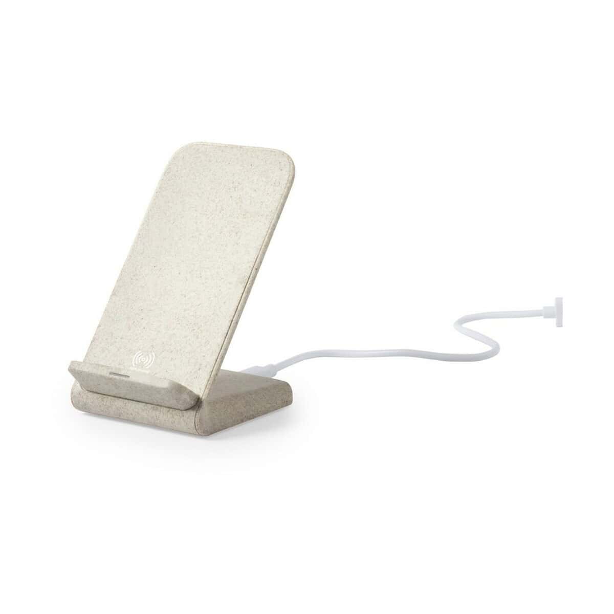 Podkładka pod telefon z bezprzewodową ładowarką, nowoczesne gadżety biurowe.