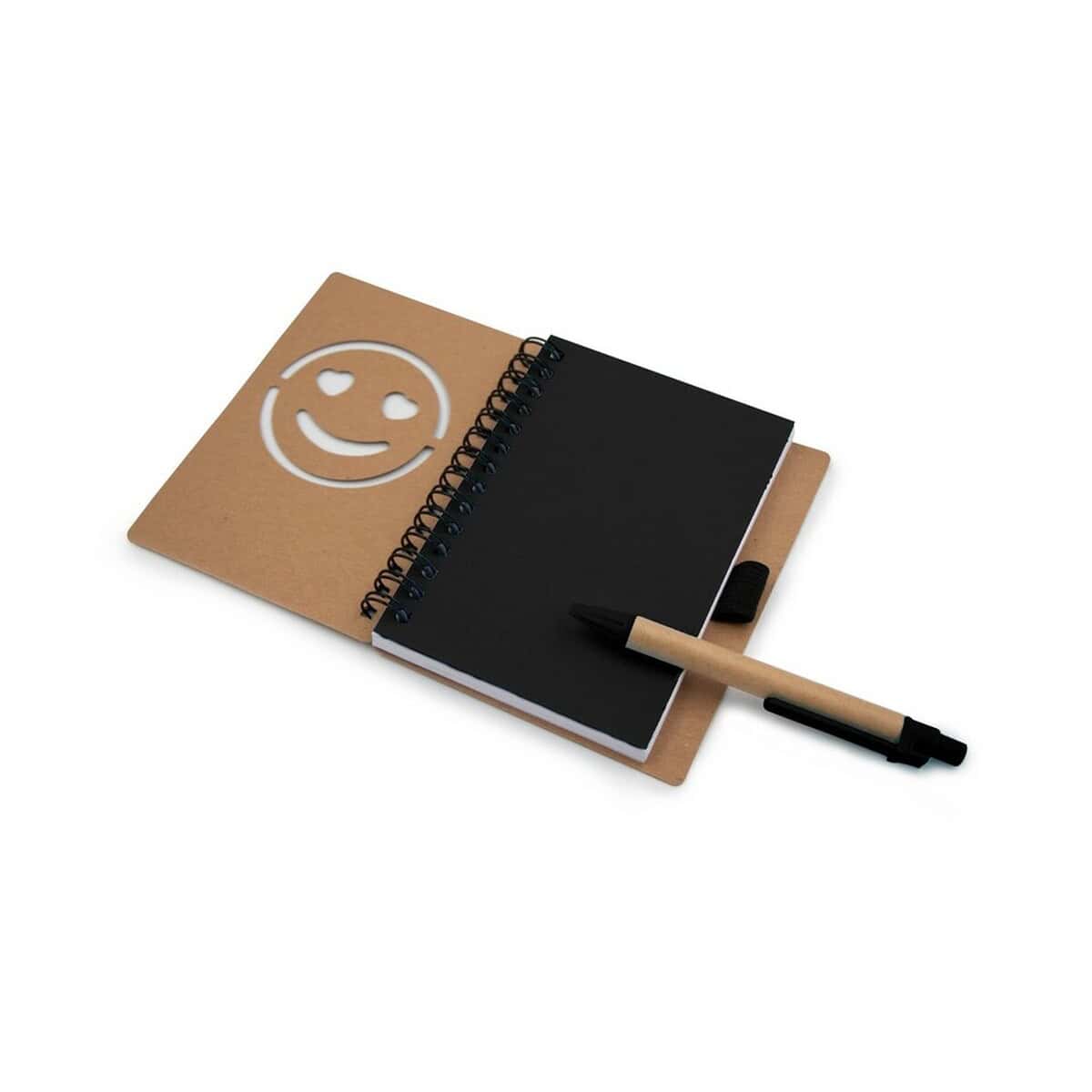 Notatniki z logo – notatnik ok. b7 „uśmiechnięta buzia” z długopisem | dylan V7247-03_AAA02 Uśmiechnięta emotikona na notesie rekreacyjnym z długopisem na białym tle.