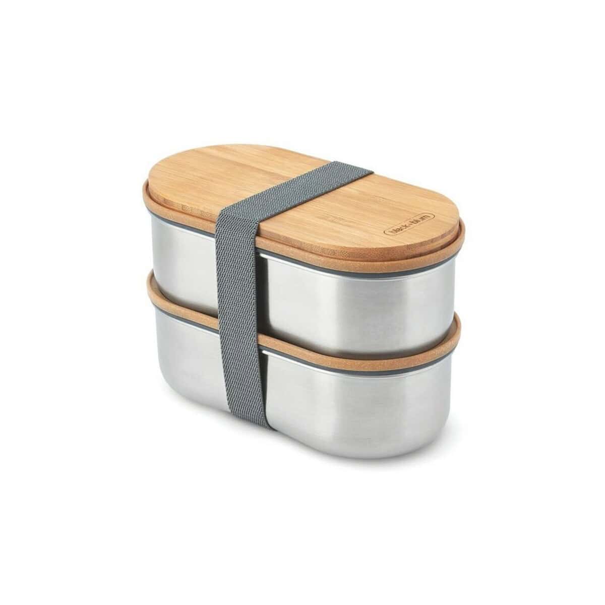 Przenośny lunchbox z drewnianą pokrywką i metalową obudową, idealny do przechowywania jedzenia na wy.